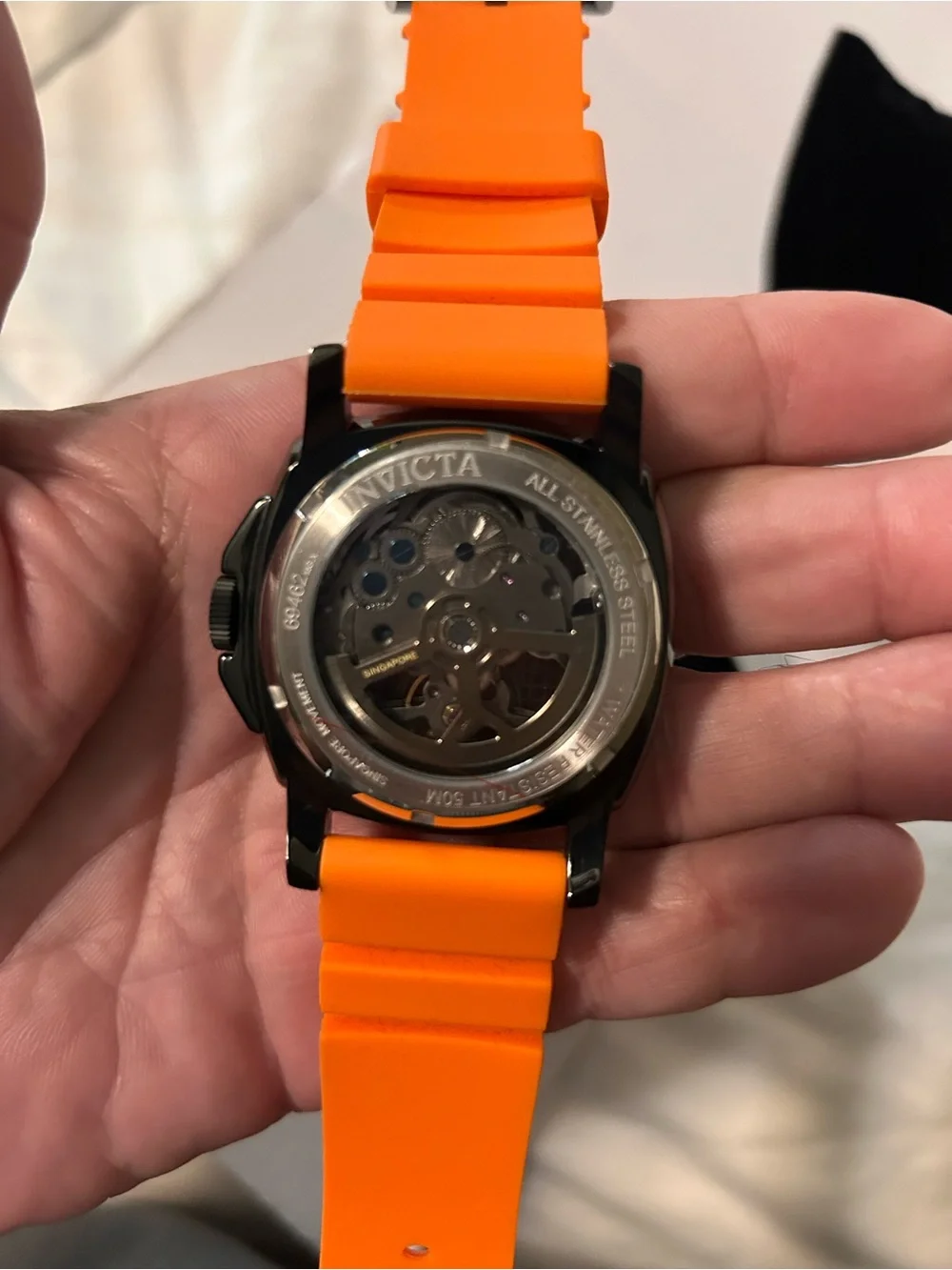 Invicta Black and Orange Skeleton Dial Dive Watch